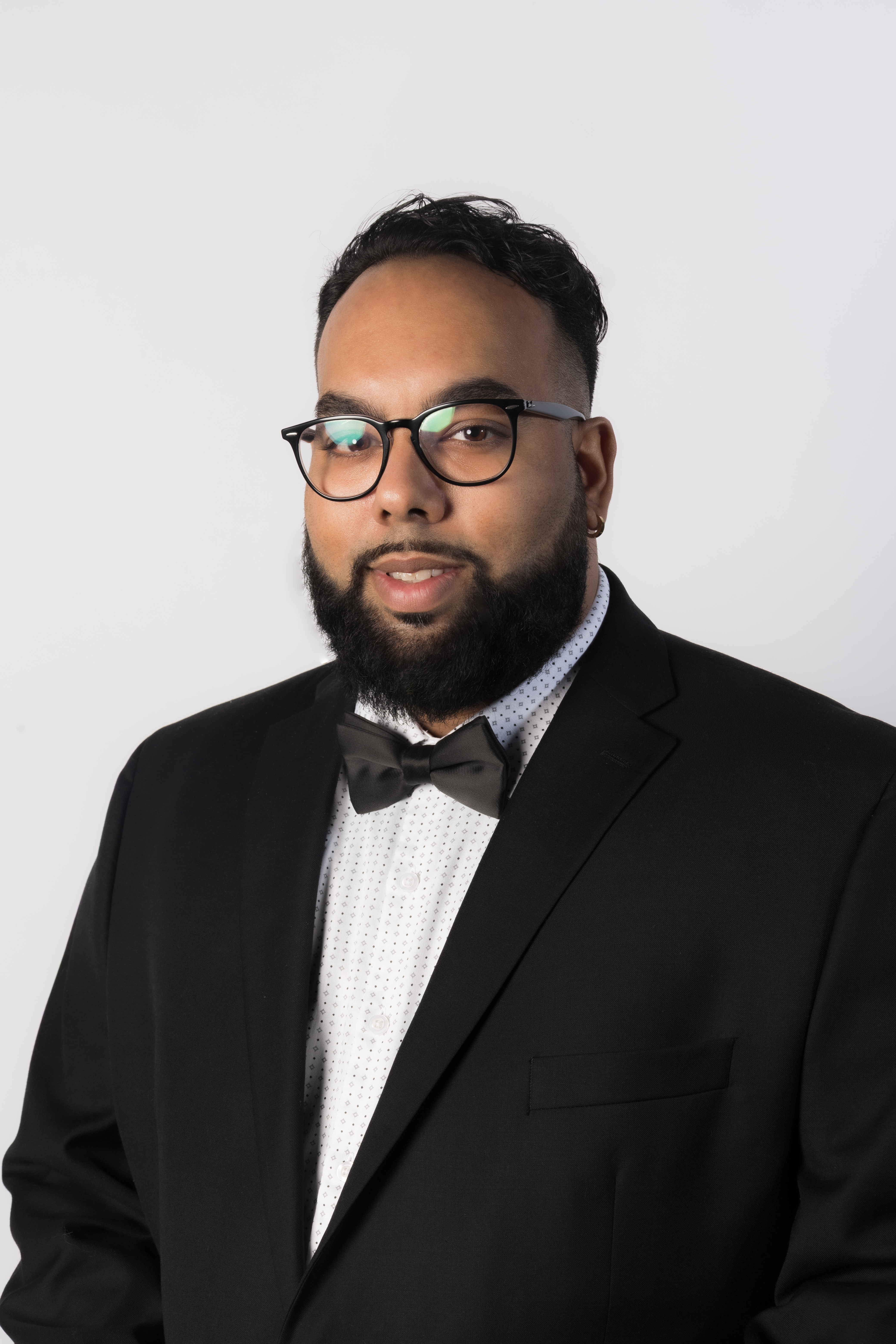 Professional headshot of Demetri Ramlogan